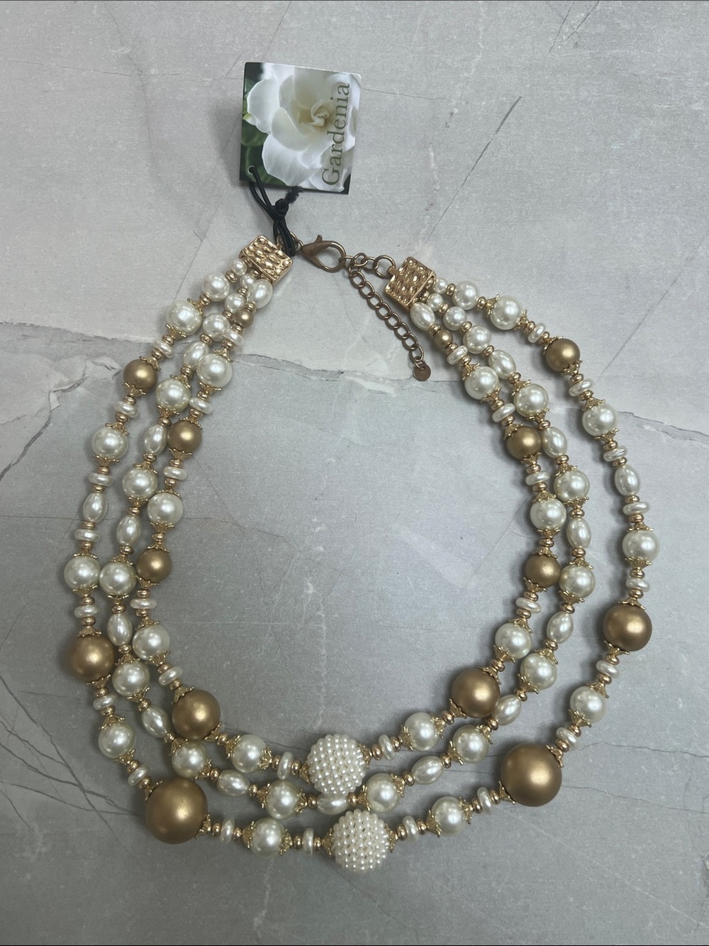 NWT- Gardenia triple-strand necklace